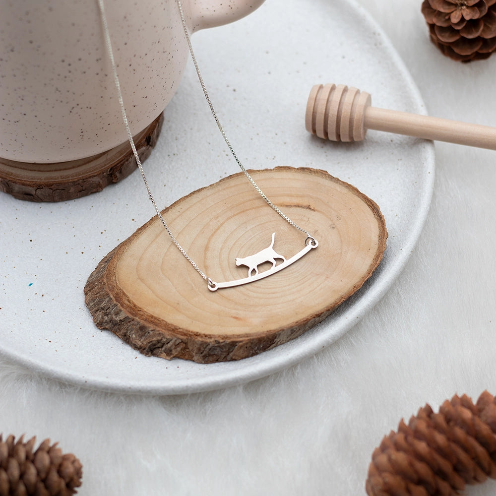 Strolling Cat Necklace with whimsical cat pendant on a delicate chain