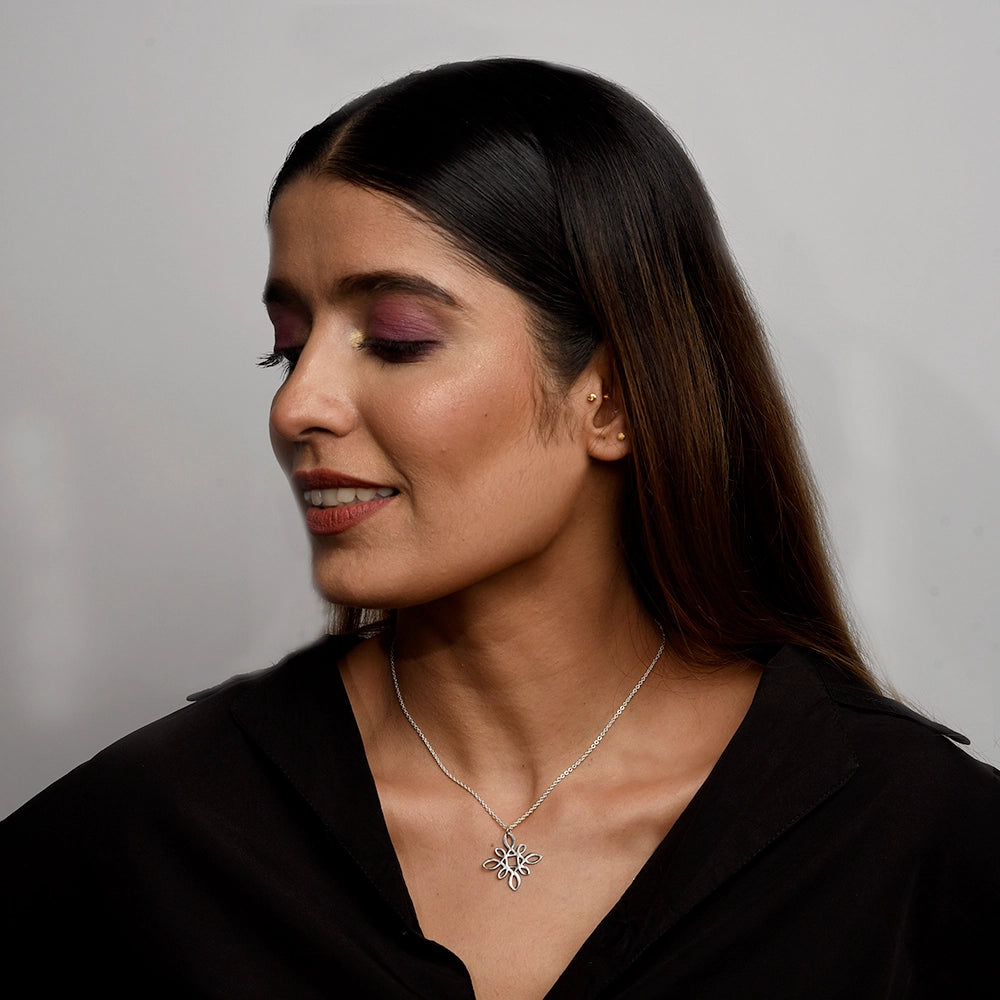 Square Celtic Knot Necklace with intricate Celtic knot design on a polished chain