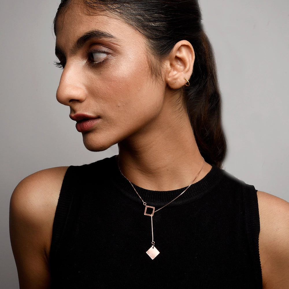 Squaring Off Necklace with sleek squared pendant on a modern chain