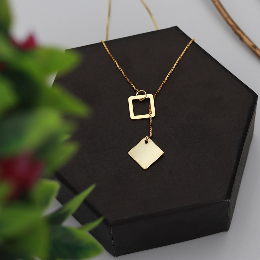 Squaring Off Necklace with sleek squared pendant on a modern chain