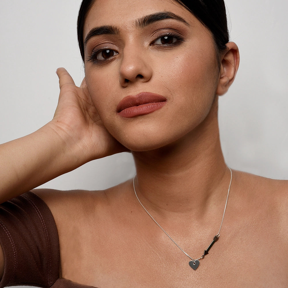 Cupid's Heart and Arrow Necklace with delicate heart and arrow pendant on a fine chain