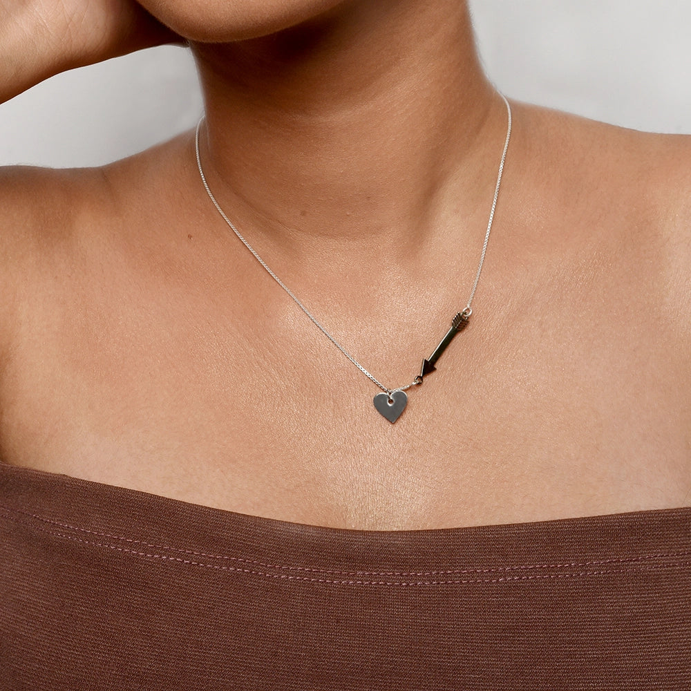 Cupid's Heart and Arrow Necklace with delicate heart and arrow pendant on a fine chain