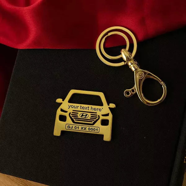 Modern metal keychain for Hyundai Venue, engraved with personal detail