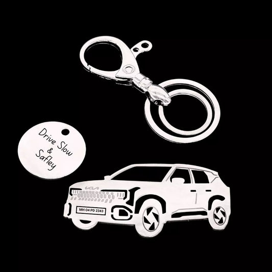 A custom Kia Seltos keychain featuring your name and number in a sleek plate-style design