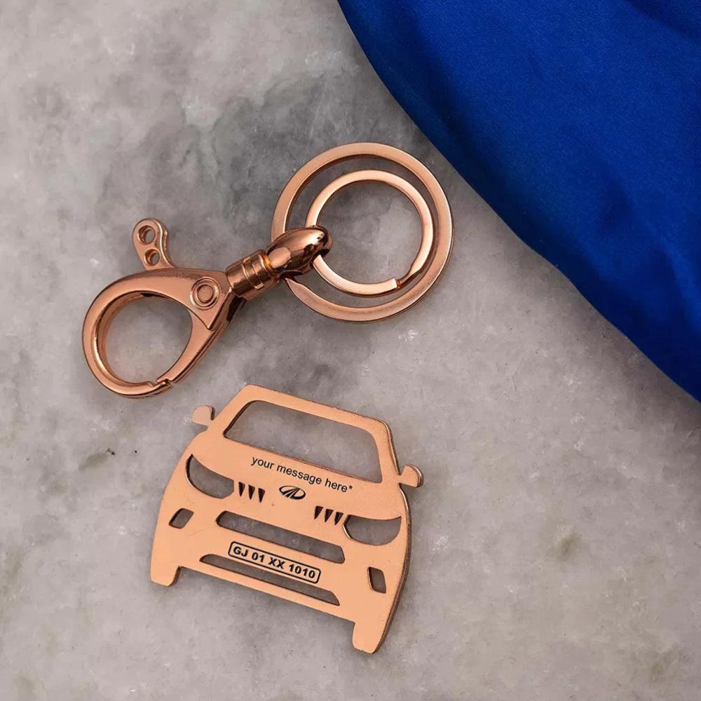 Compact metal key accessory matching the KUV100 style personalized 