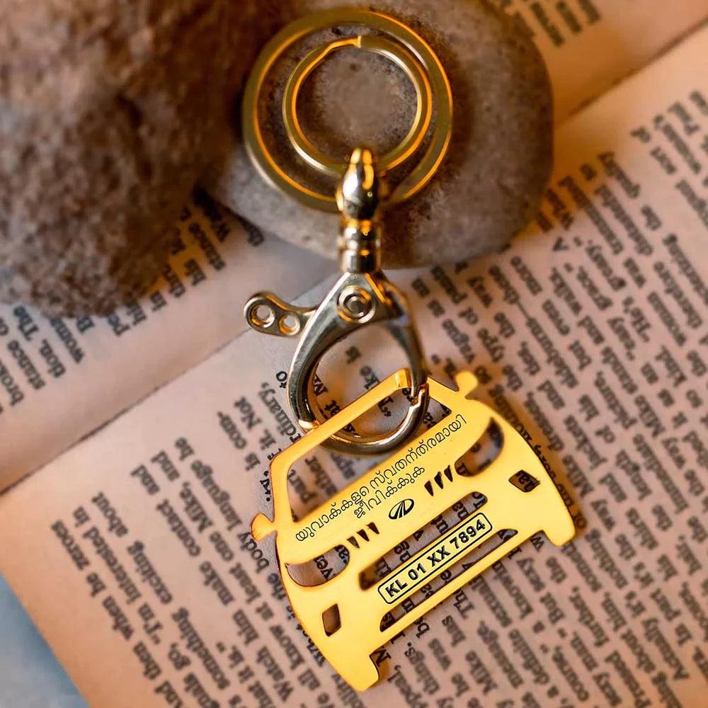 Mahindra KUV100 themed keyring with a modern feel