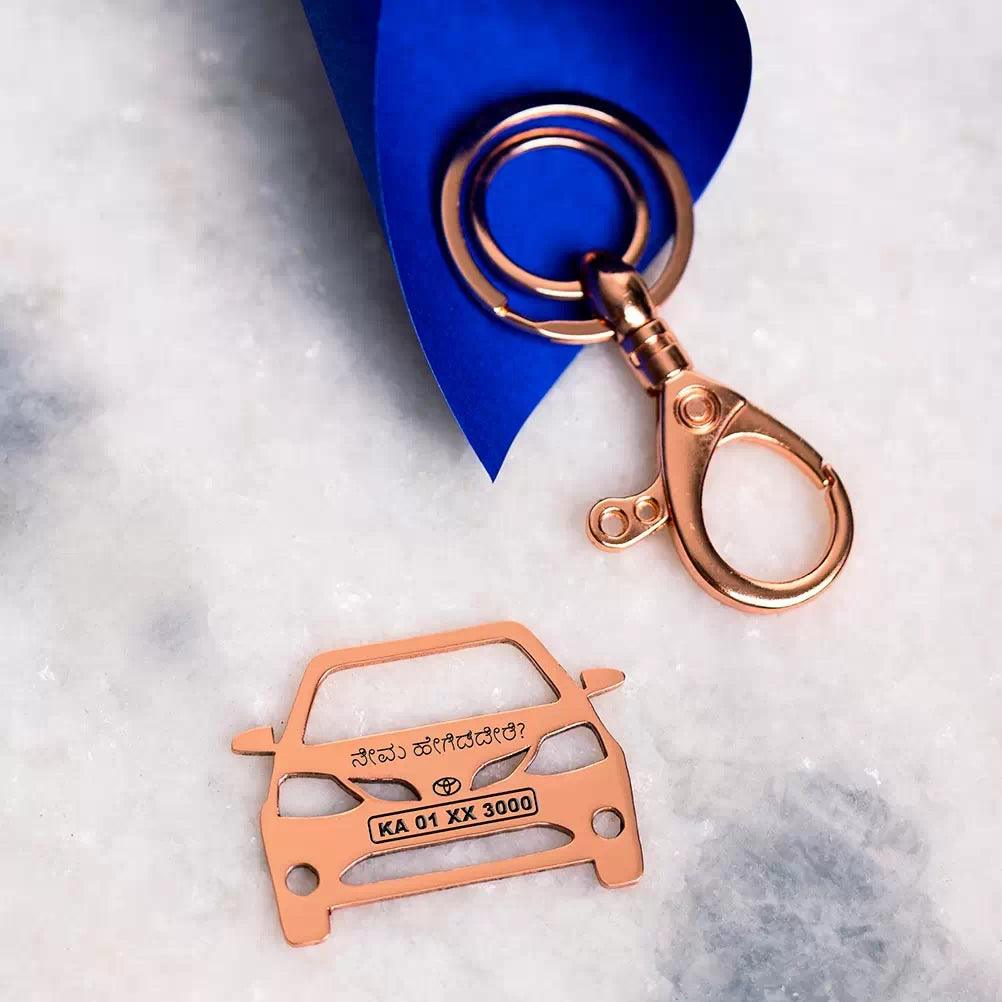 Rose gold car keychain premium polish close-up