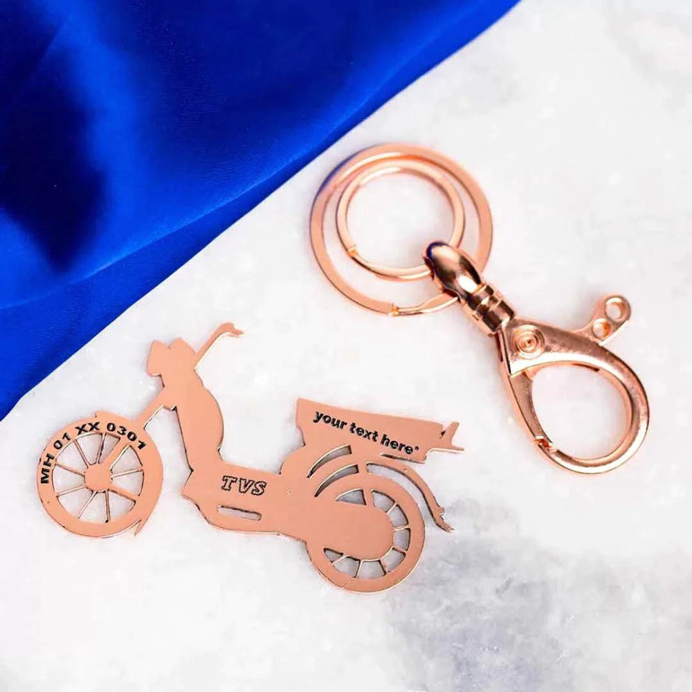 Premium metal keychain designed for TVS XL 100 riders